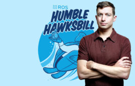 Brian Gerkey身后是ROS Humble Hawksbill的标志